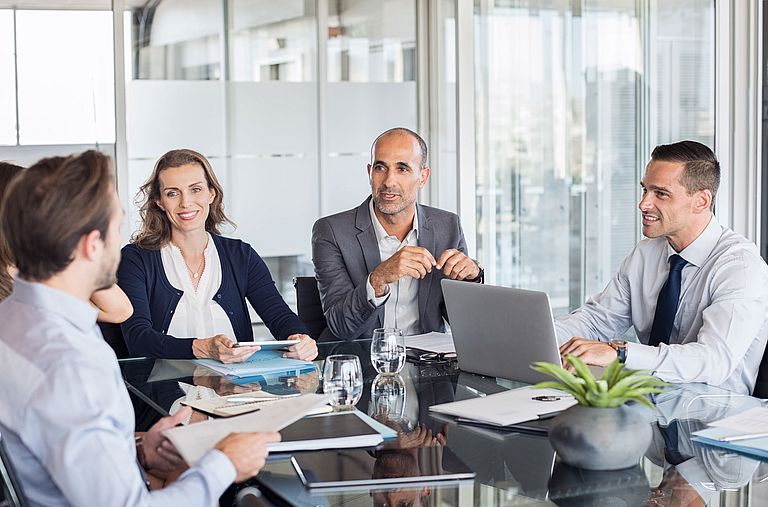 Experienced professionals in a meeting